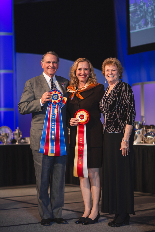 Arabian Horse Association President Cynthia Richardson (r) presenting Dick and Nan Walden of Rancho Soñado with 2 National USEF Horse of the Year Awards in Lexington, KY on Jan 17. 2015.